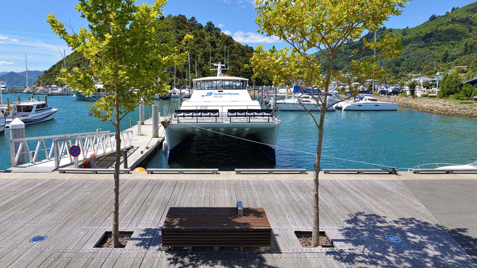 Front on view of MV Odyssea launch docked at Picton Marina used for group and charter cruises, at the top of New Zealand's South Island.